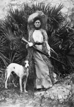 Woman with Dog and Shotgun